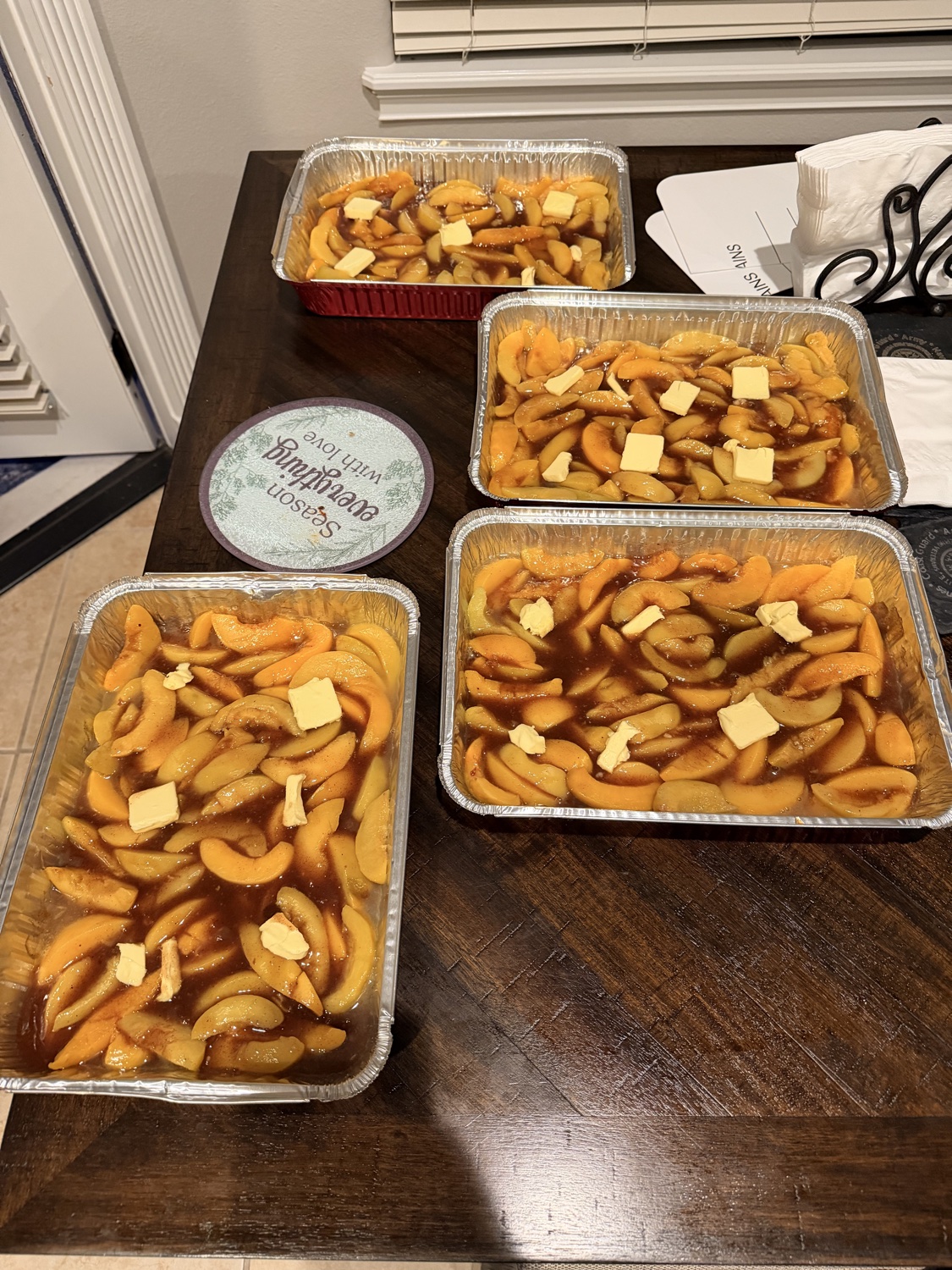 Trays of peach cobbler ready for serving