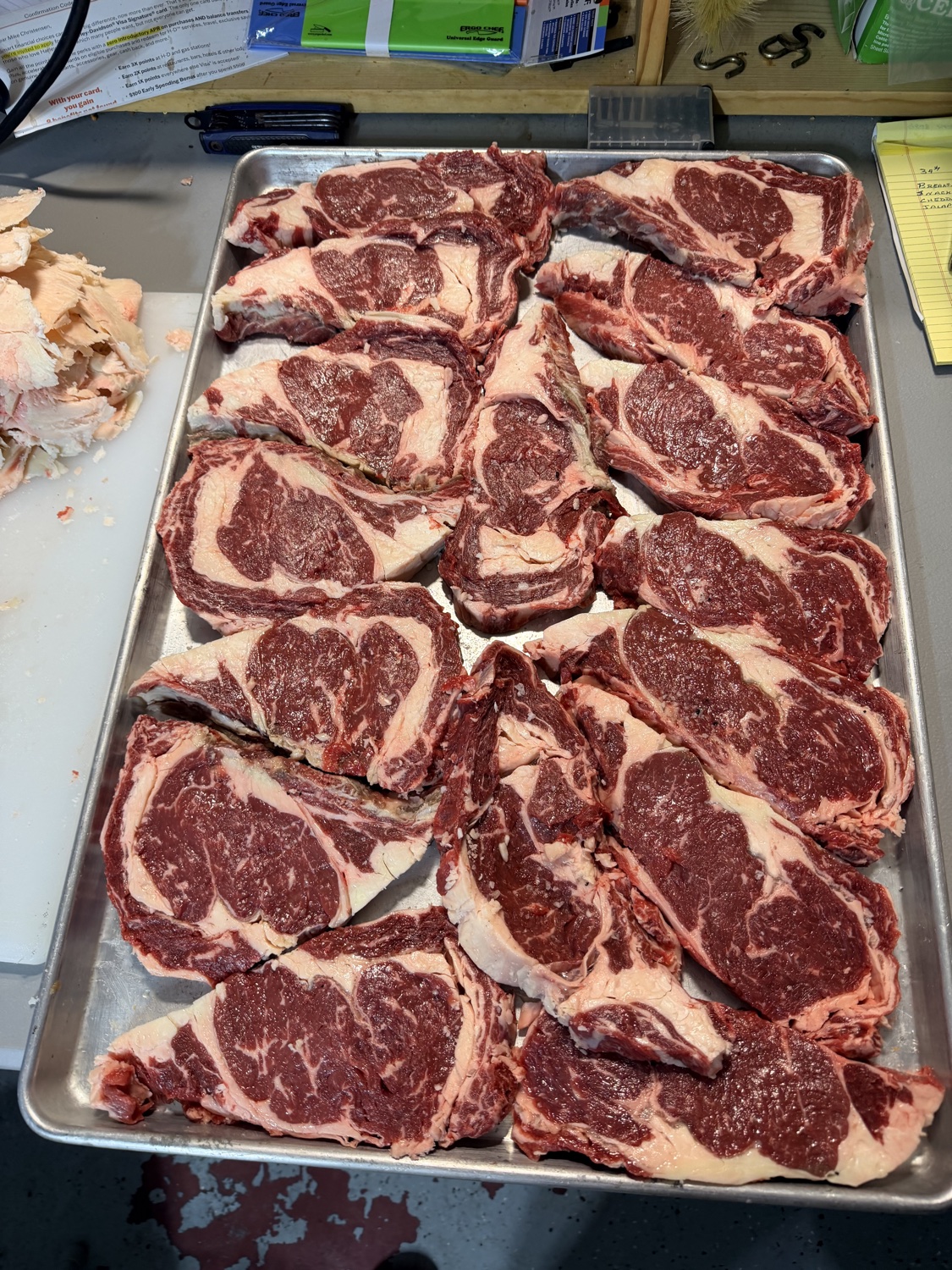 Fresh-cut ribeye steaks prepped for the grill