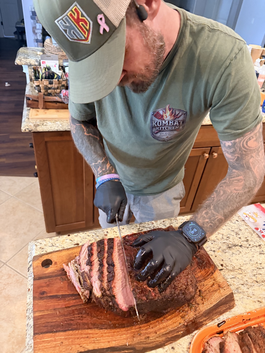 Slicing smoked brisket on the cutting board